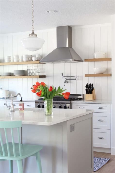 How To Install A Vertical Shiplap Backsplash A Nod To Navy Kitchen Cabinets And Backsplash