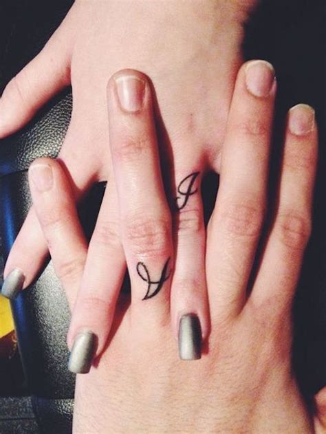 Check spelling or type a new query. Cursive letter A and J tattoo on the ring finger | www ...
