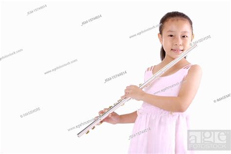 Girl Blowing Flute Smiling Portrait Stock Photo Picture And Royalty