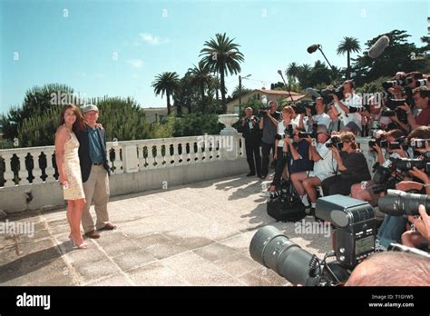 Cannes France 19 May 1999 Actress Elizabeth Hurley And Director Ron