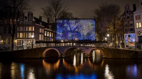 van gogh s starry night reimagined as amsterdam light festival installation