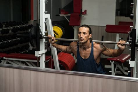 Bodybuilder Doing Squats With Barbell Stock Image Image Of Lifestyle