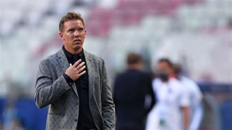 With a grey checkered suit jacket. 6 Premier League Clubs Julian Nagelsmann Could Manage Next ...