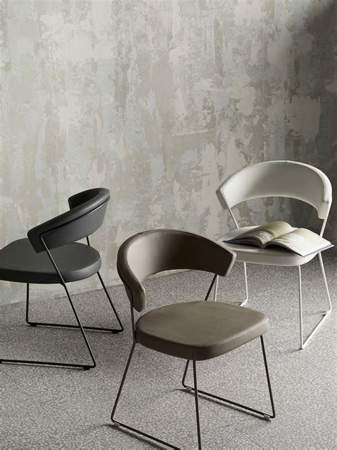 Connubia calligaris academy four leg chairmade in italy, the connubia academy chair comes with metal legs and a high strength polypropylene seat. Connubia by Calligaris New York Leather Dining Chair at ...