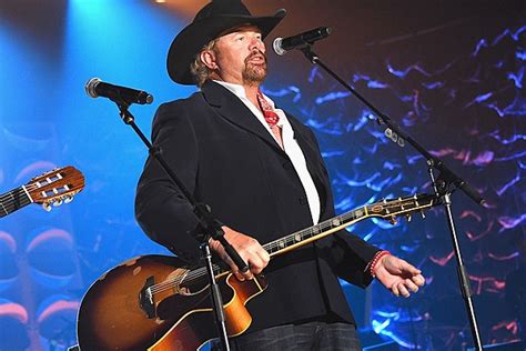 Win A Signed Toby Keith Signature Takamine Guitar