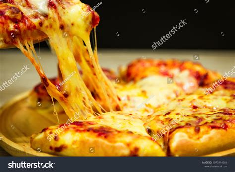 Hot Pizza Slice Dripping Mozzarella Cheese Foto Stock 1070314289 Shutterstock