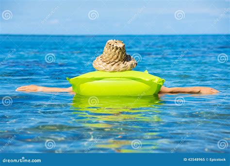 Woman Floating On Raft In Tropical Ocean Stock Image Image Of Leisure
