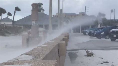 It may have started off as an ordinary day, but it's going to. Sand Beach Business : WINDY Sand blowing wall parking lot ...