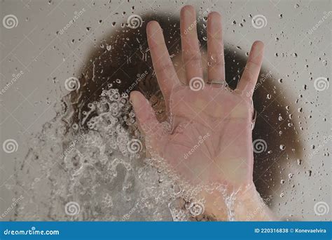 Female Hand On The Glass Door Of The Shower Stall Sensual Portrait Of