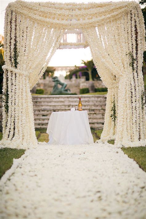 Your florist will/should have included the removal and cleanup of all your flower arrangements after the wedding in the price. Unique Wedding Altar Ideas and Pictures | POPSUGAR Home