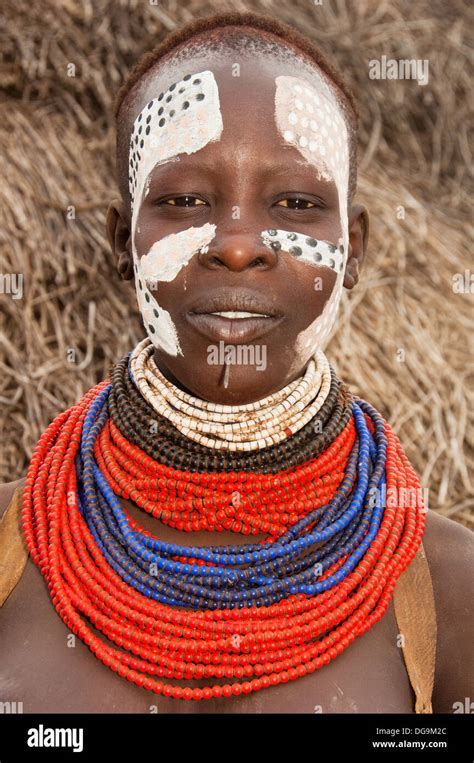 Young Karo Woman With Lots Of Colorful Necklaces Lip Piercing And