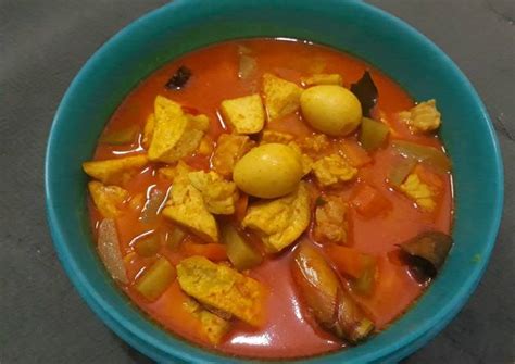Sepotong ikan asin yang ditambahkan ke dalam sayur, membuat masakan. Resep Lodeh sayur campur tahu telur puyuh oleh Ucha Puspa ...