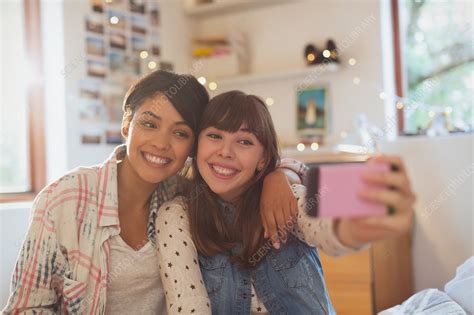Enthusiastic Young Women Friends Taking Selfie Stock Image F0175058 Science Photo Library