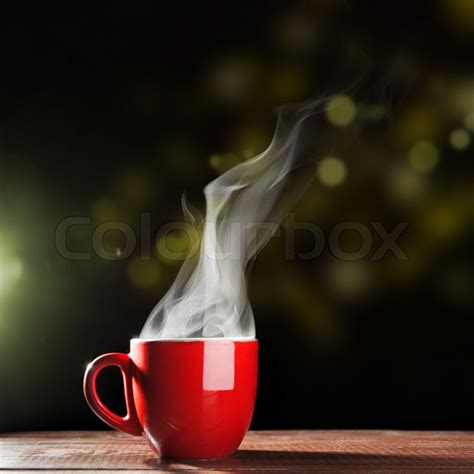 Steaming Coffee Cup On Dark Background Stock Image Colourbox