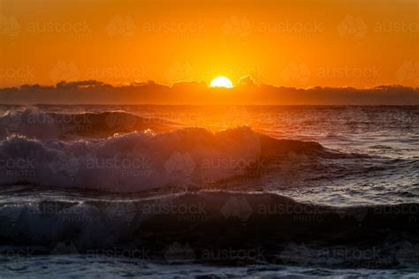 Image Of Waves And Beach At Sunrise Austockphoto