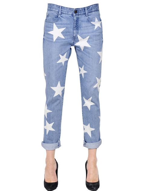 Lyst Stella Mccartney Stars Printed Stretch Cotton Denim Jeans In Blue