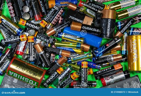 A Close Up Of A Pile Of Different Used Batteries Editorial Photography