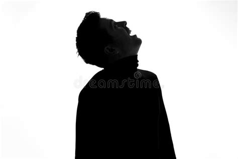 Silhouette Of Young Man Looking Up Being Excited Stock Photo Image