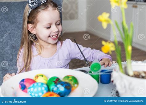 Smiling Little Girl Coloring Easter Eggs Stock Image Image Of