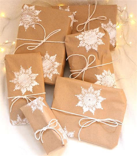 Creating beautiful and bespoke christmas wrapping paper is as simple as adding a few personal touches with paint or marker. DIY Christmas Wrapping Paper