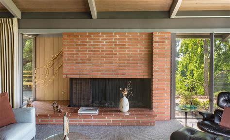 A simple white mantel provides display space, but maintains. Architectural Mid-Century Modern on Nearly Half an Acre in ...
