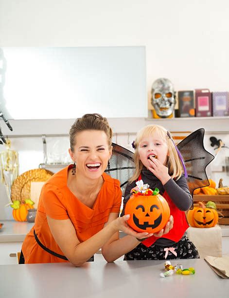 Woman Eating Halloween Candy Stock Photos Pictures And Royalty Free