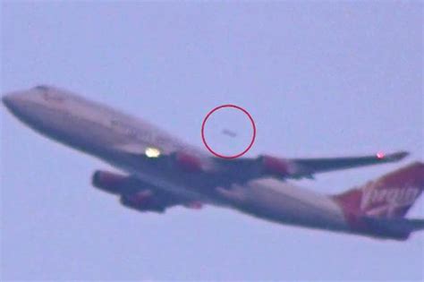Flying Saucer UFO Caught On Camera Flying Past Virgin Atlantic Plane