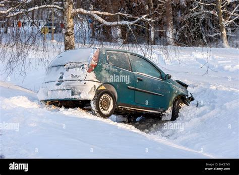 Car Accident In Winter Conditions Vehicle Wreck In A Ditch In Snow