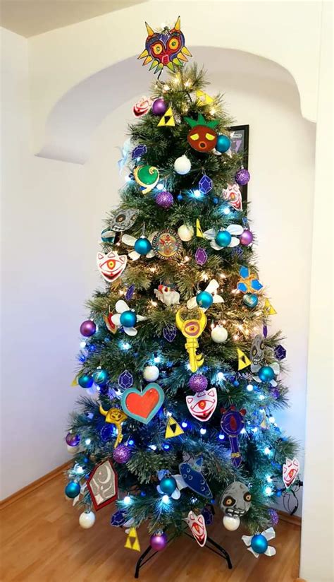 So saying, he broke a branch from the fir tree that grew near the door, and he planted it in the ground and disappeared. Legend of Zelda themed Christmas tree with handmade ...