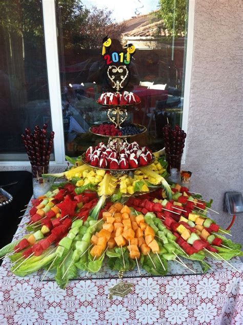 Outdoor graduation parties are some of the most popular graduation party venues. Perfect fruit station #gradparty | Outdoor graduation parties, Graduation party high, Graduation ...