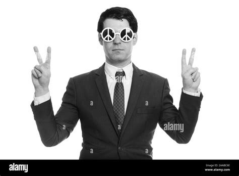 Handsome Businessman Wearing Sunglasses With Peace Sign And Doing Peace