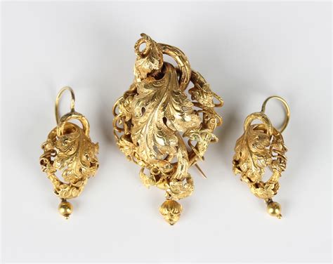 A Victorian Gold Brooch Of Vine Leaf And Rustic Entwined Design Circa