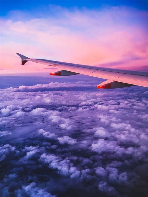 Wing Of An Airplane At Sunset Stock Photo Image Of Holiday