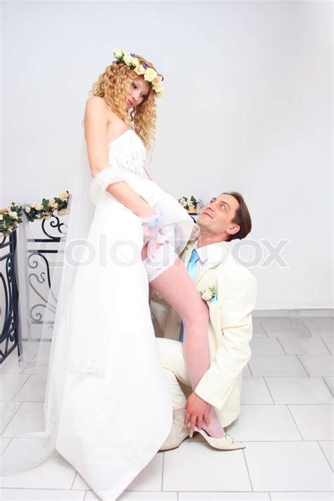 Young Couple Posing In A Studio On The Stock Image