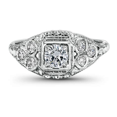 Maybe you would like to learn more about one of these? Vintage 14k White Gold & Diamond Engagement Ring, .62ct - 1950s