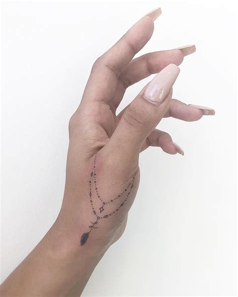 chronic ink tattoo joanna roman fine line tattoo single needle finger tat small finger tattoos