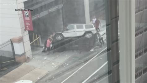 Video Bystanders Help After Car Falls From Fourth Floor Of Cbd Parking Garage