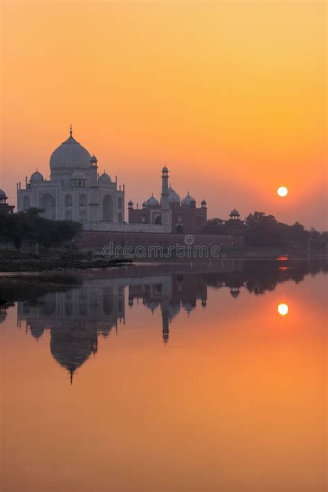 Taj Mahal Reflected In Yamuna River At Sunset In Agra India Stock