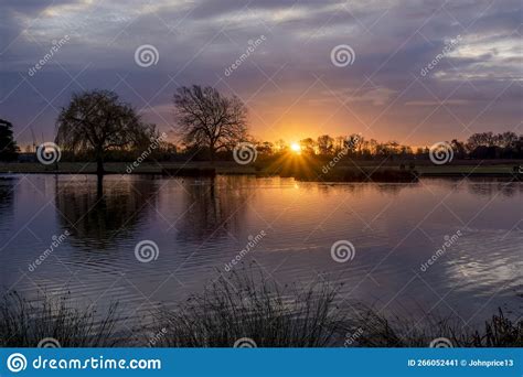 Sunrise Over A Lake With Reflections Stock Image Image Of Dawn Lake