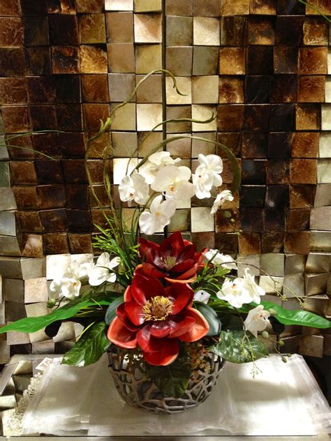 When you need flowers delivered in the space city, look no further than proflowers. #Magnolia & Orchid floral #arrangement. Designed by ...