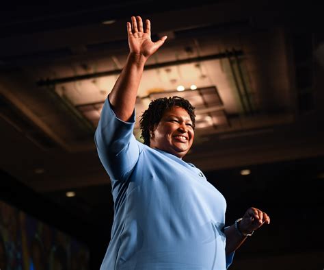 ga governor race stacey abrams attacks brian kemp over voter rolls