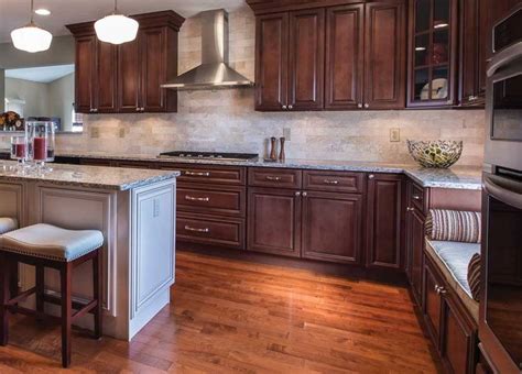Rental kitchens are notorious for crummy cabinets, and there's little to be done if your landlord doesn't allow permanent changes. Signature Brown - Kitchen Pro Design