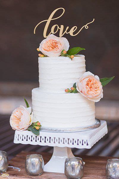 Two Tier Blush Flower Topped White Wedding Cake Wedding