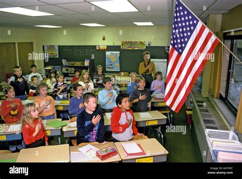 3 Rd Grade Stands Each Morning To Say Pledge Of Allegiance To The Stock