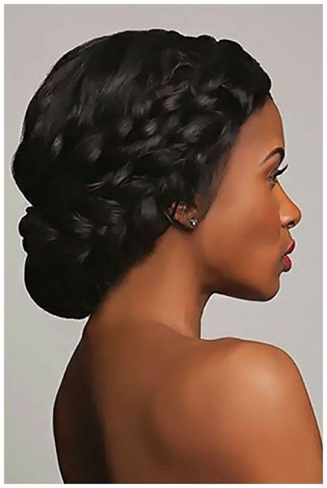 Tuck the end of the braid underneath to create an easy wedding hairstyle that stays off your shoulders and neck. #CornRow #BoxBraid #HairCuts black women wedding ...