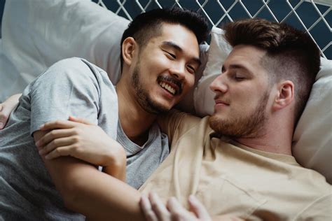 Two Men Cuddling In Bed · Free Stock Photo