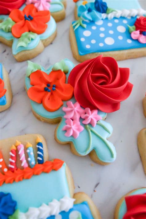 Ree tops her christmas cake cookies with green frosting and. The Pioneer Woman Birthday Flowers Party Cookies | Birthday woman, Flower cookies, Floral