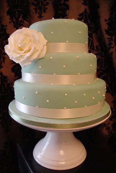 Three tier square white and olive green wedding cake. Pearl Wedding Cake in Sage Green - Cake by Floriana - CakesDecor
