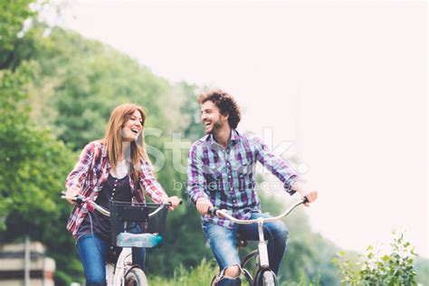 Cheerful Couple Riding Bicycle Together Stock Photo Royalty Free