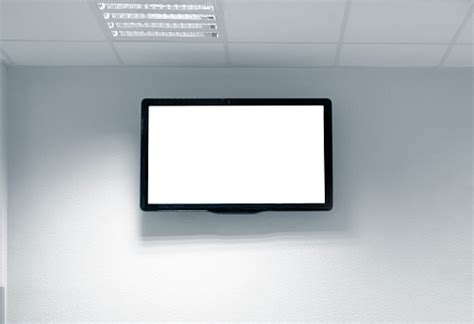 Blank White Tv Screen On The Wall Stock Photo Download Image Now Istock